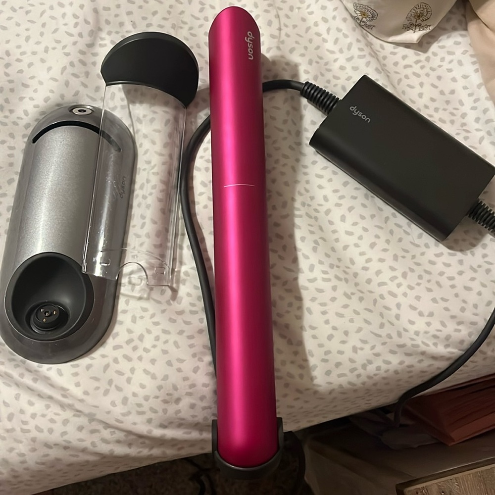 .Dyson Corrale Hair StraightenerFuchsia/Nickel with charger stand.